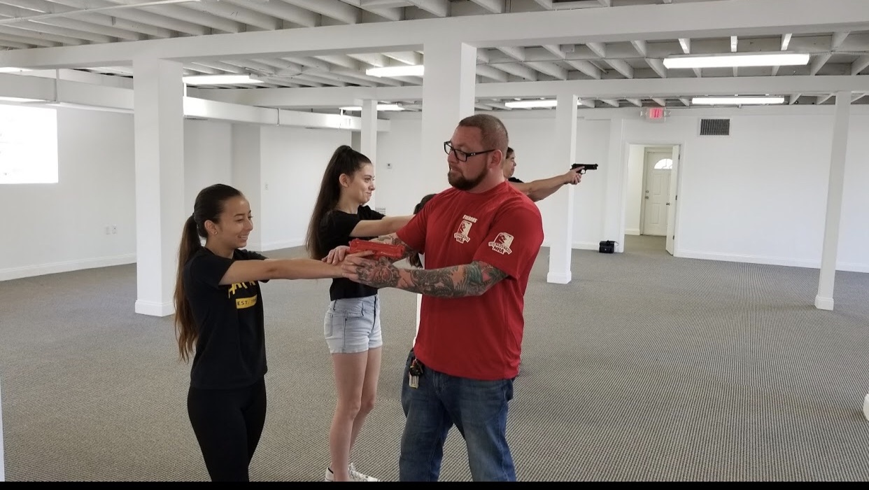 Instructor helping students